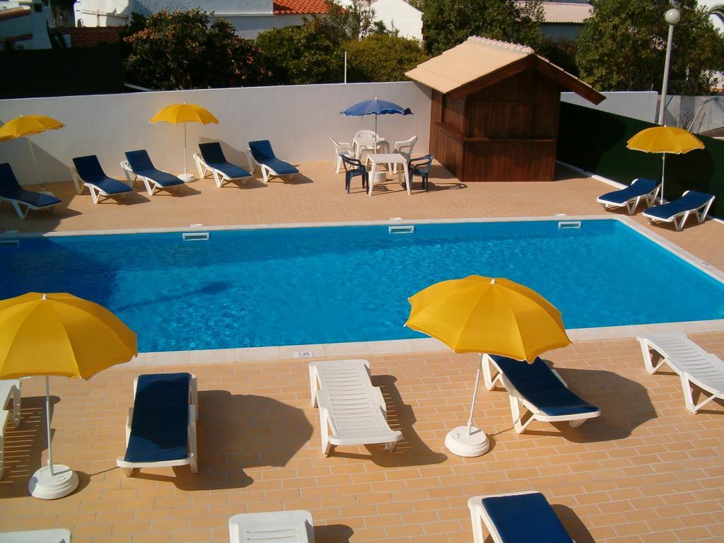 One-Bedroom Apartment with Balcony and Pool View