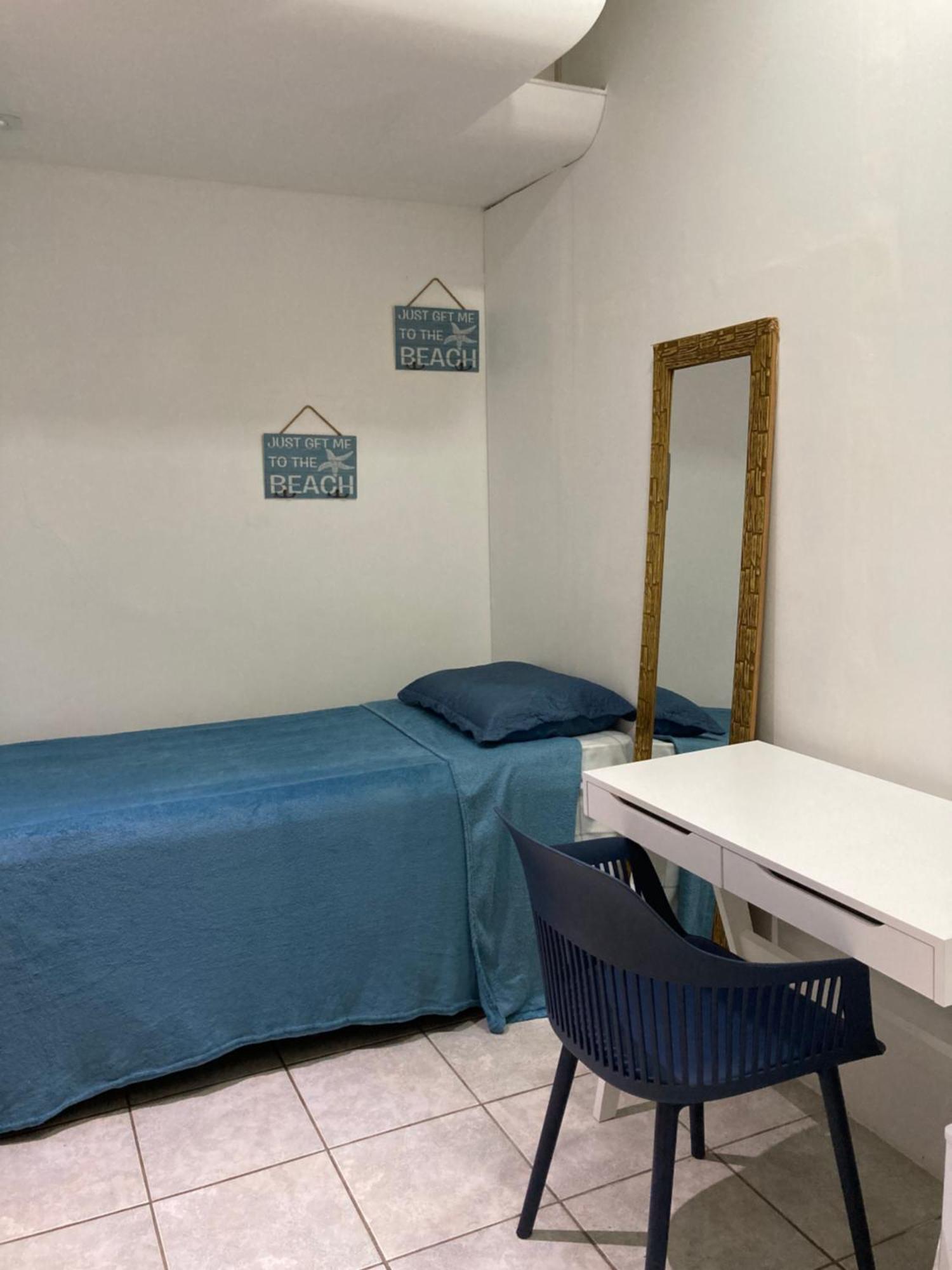 Quarto Individual com Banheiro Compartilhado