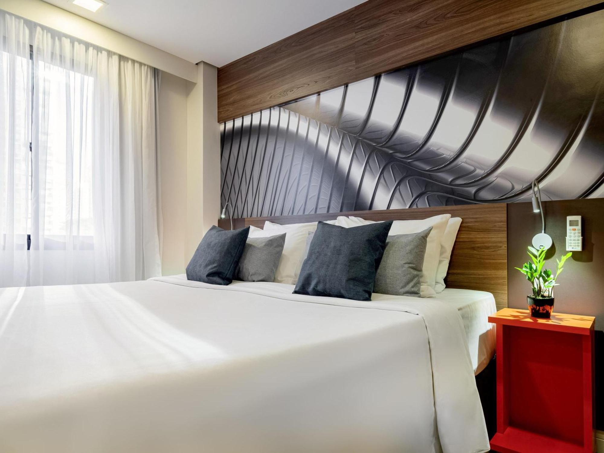 Suite Júnior com Cama King-size e 2 Camas Individuais