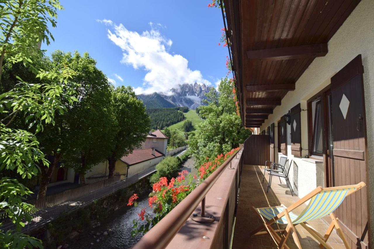 AT 112-4 - Appartamento Bilocale con Balcone e Vista Fiume