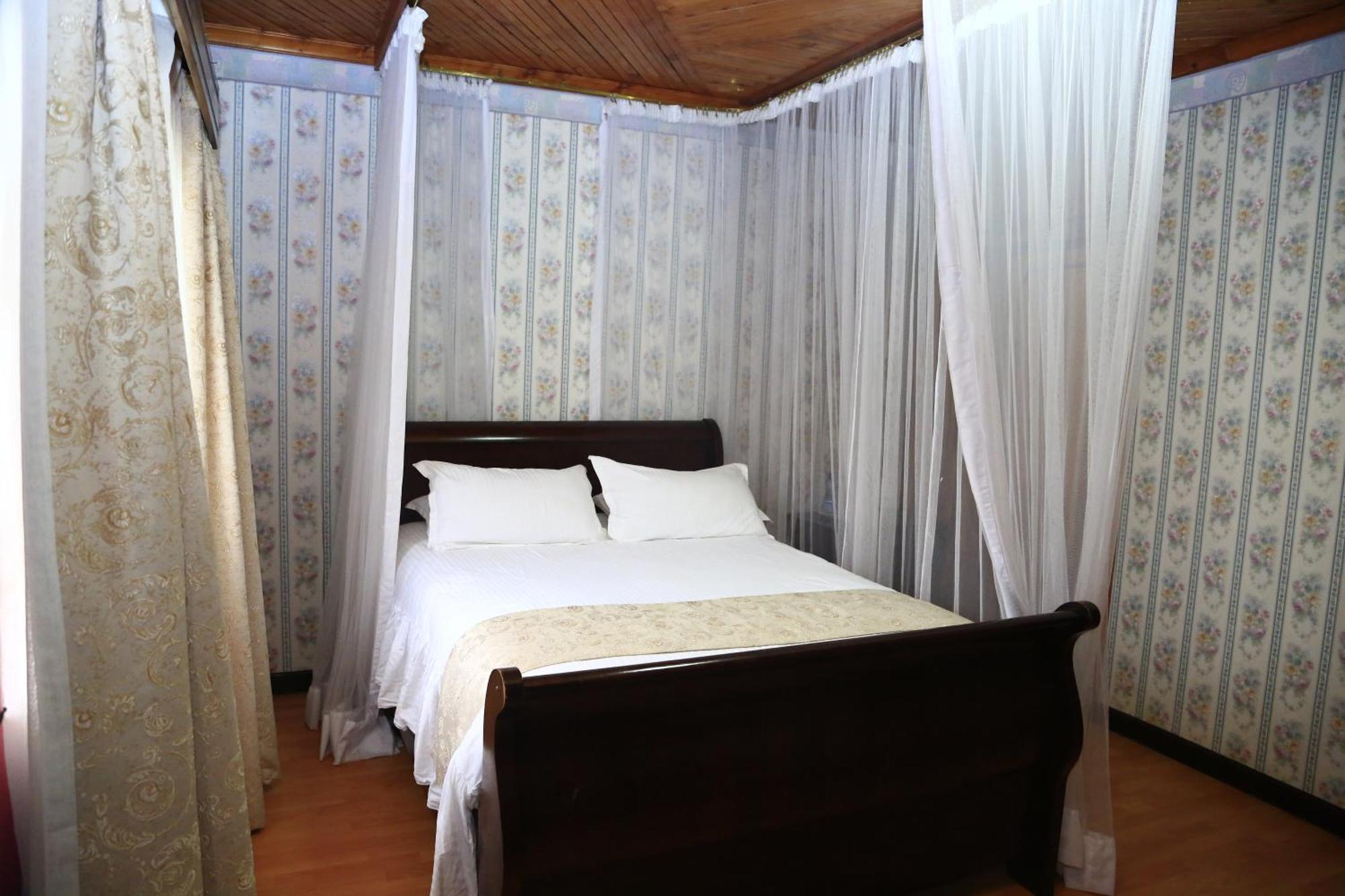 Deluxe Doppelzimmer mit Gartenblick