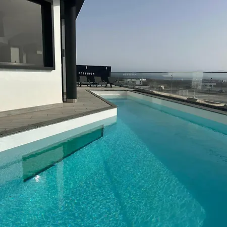 Villa Poseidon Corralejo With Private Heated Pool, Sauna And Stunning Volcano Views By Amazzzing Travel-3