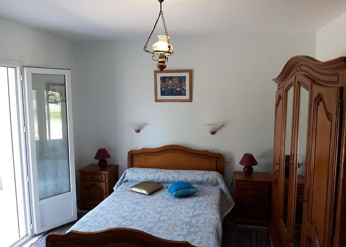 Appartement en rez de chaussee de maison