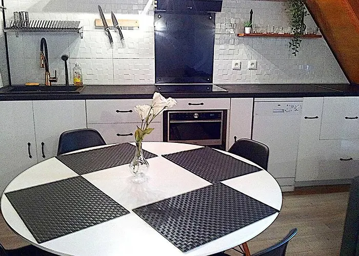 Appartement en duplex - tout confort plein-centre