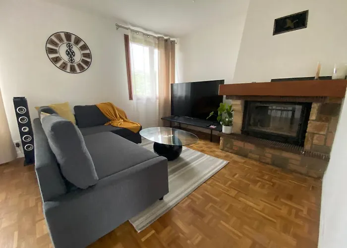 Maison chaleureuse avec un grand jardin