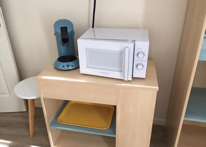 Chambre dans dépendance Maison de Ville + abri vélos