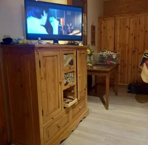L'appartement LES BOSSONS en lisière de forêt dans le chalet Génépi