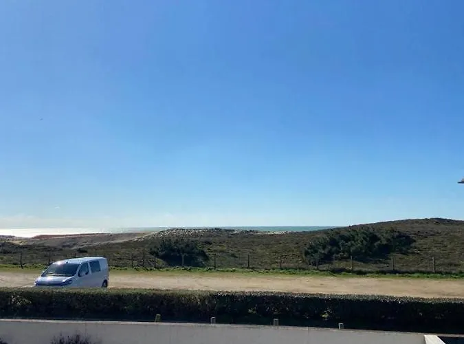 Jolie villa face aux dunes et mer