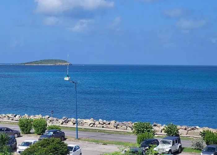Pélican duplex avec piscine commune dans résidence
