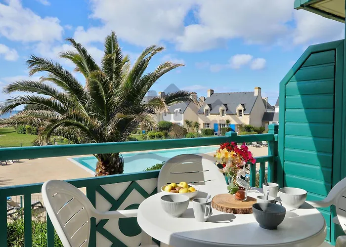 LocaLise - A18 - Appartement avec balcon - Petite vue mer à travers le palmier - Piscine de avril à septembre - Wifi inclus - Animaux admis - Draps inclus - Parking inclus