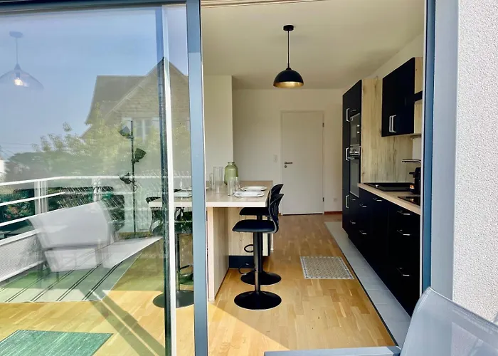 Joli appartement avec balcon au pieds des commences et des plages
