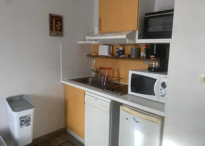 Maisonnette en bois pour 4 personne village vacances Avec