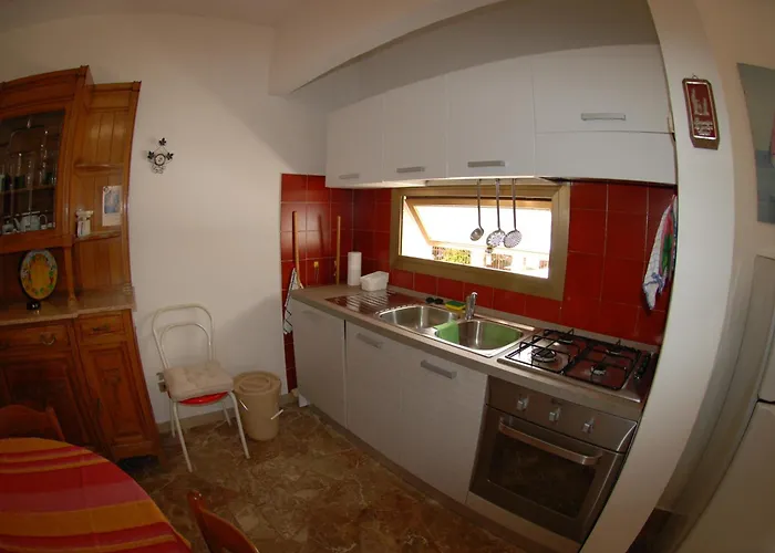 Casa con giardino e terrazzo