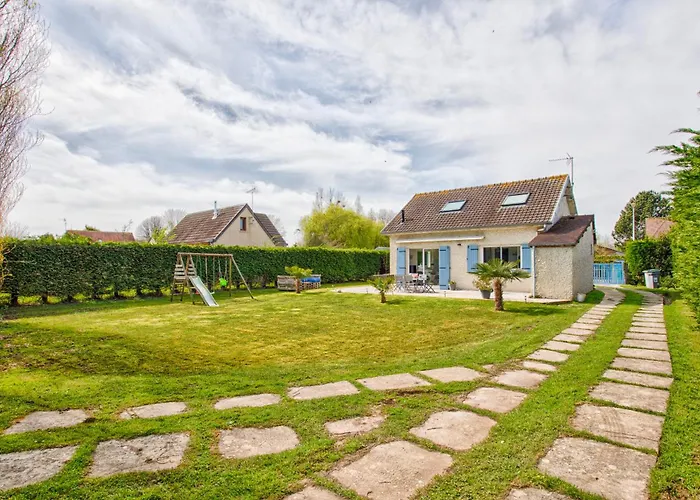 L'effet mer Maison rénovée lumineuse tout confort belle terrasse grand jardin clos sans vis à vis parking jeux pour enfants 5 mn à pied de la plage d'Asnelles et centre bourg - proche Bayeux au coeur des plages du débarquement