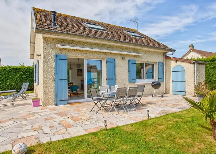 L'effet mer Maison rénovée lumineuse tout confort belle terrasse grand jardin clos sans vis à vis parking jeux pour enfants 5 mn à pied de la plage d'Asnelles et centre bourg - proche Bayeux au coeur des plages du débarquement