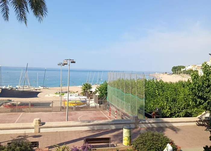 Beachfront Apartment With Sea Views & Private Parking