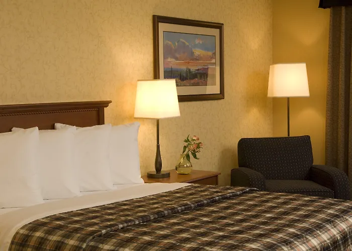 Merit Hotel & Suites