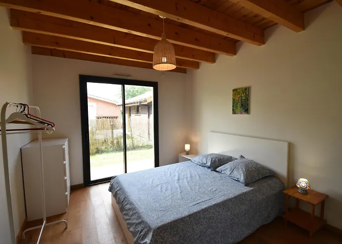 Carolins - Saubion agréable villa en bois dans quartier résidentiel à 400m du bourg de saubion