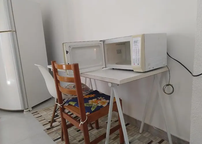 Suite 1 com Ar-Condicionado, TV, Wi-Fi e Geladeira