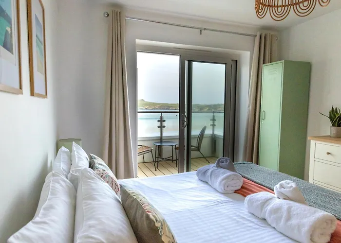 The Beach House & Porth Sands Apartments