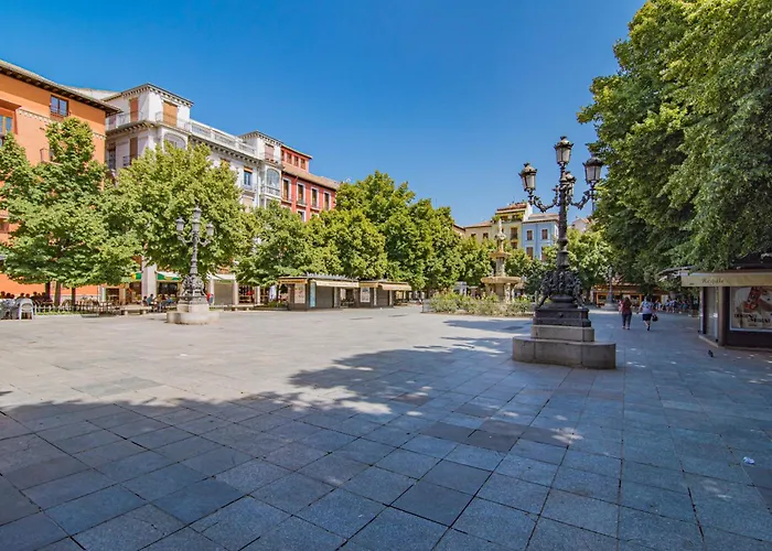 Apartamentos Caballerizas Granada con parking gratuito en pleno centro