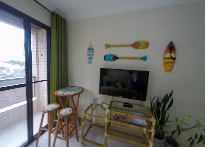 Apto pé na areia da Praia Caiçara, check-in flexível Até 6 pessoas