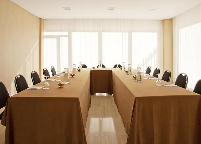 Nh Suites Prisma